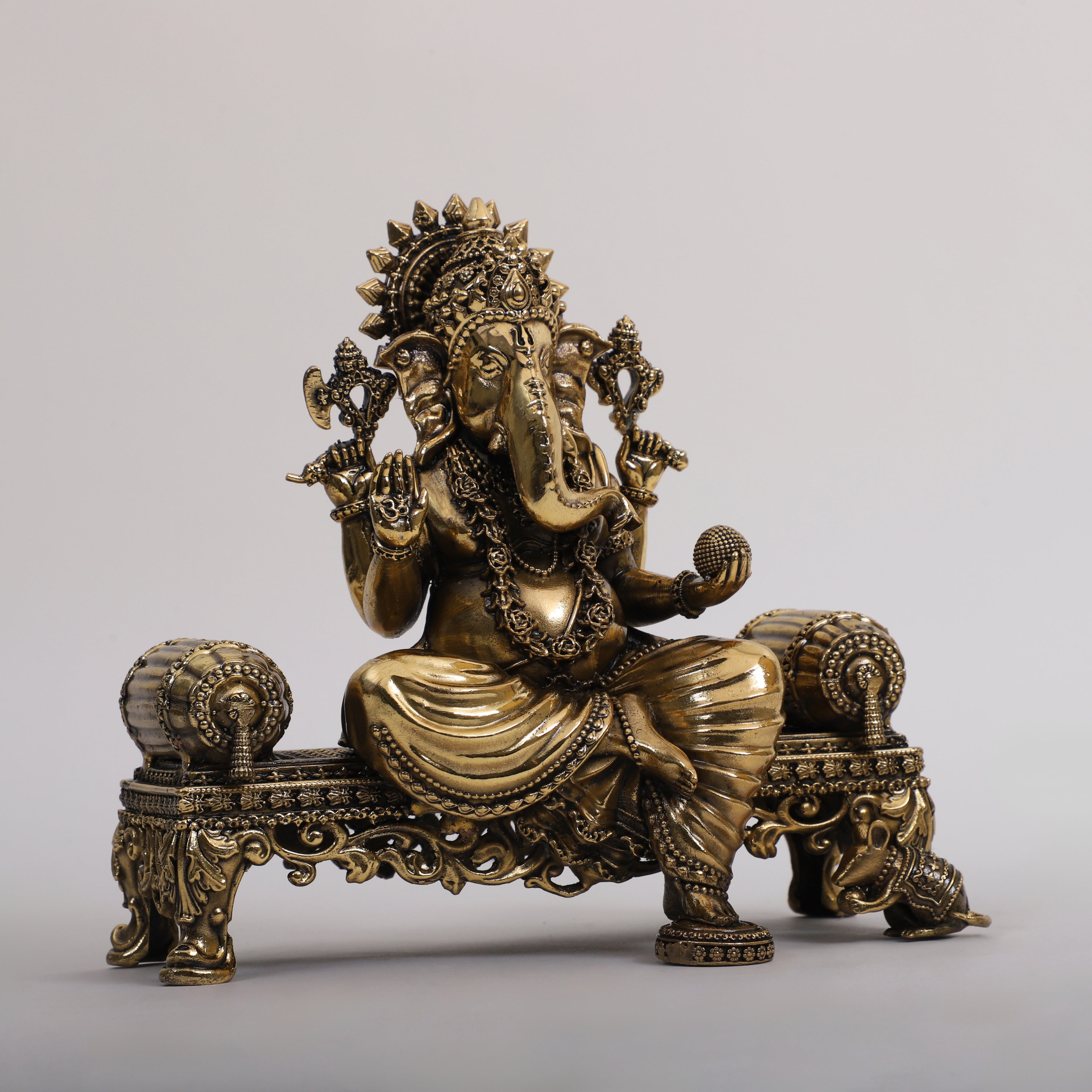 Brass Lord Ganesha sitting Singhasaan