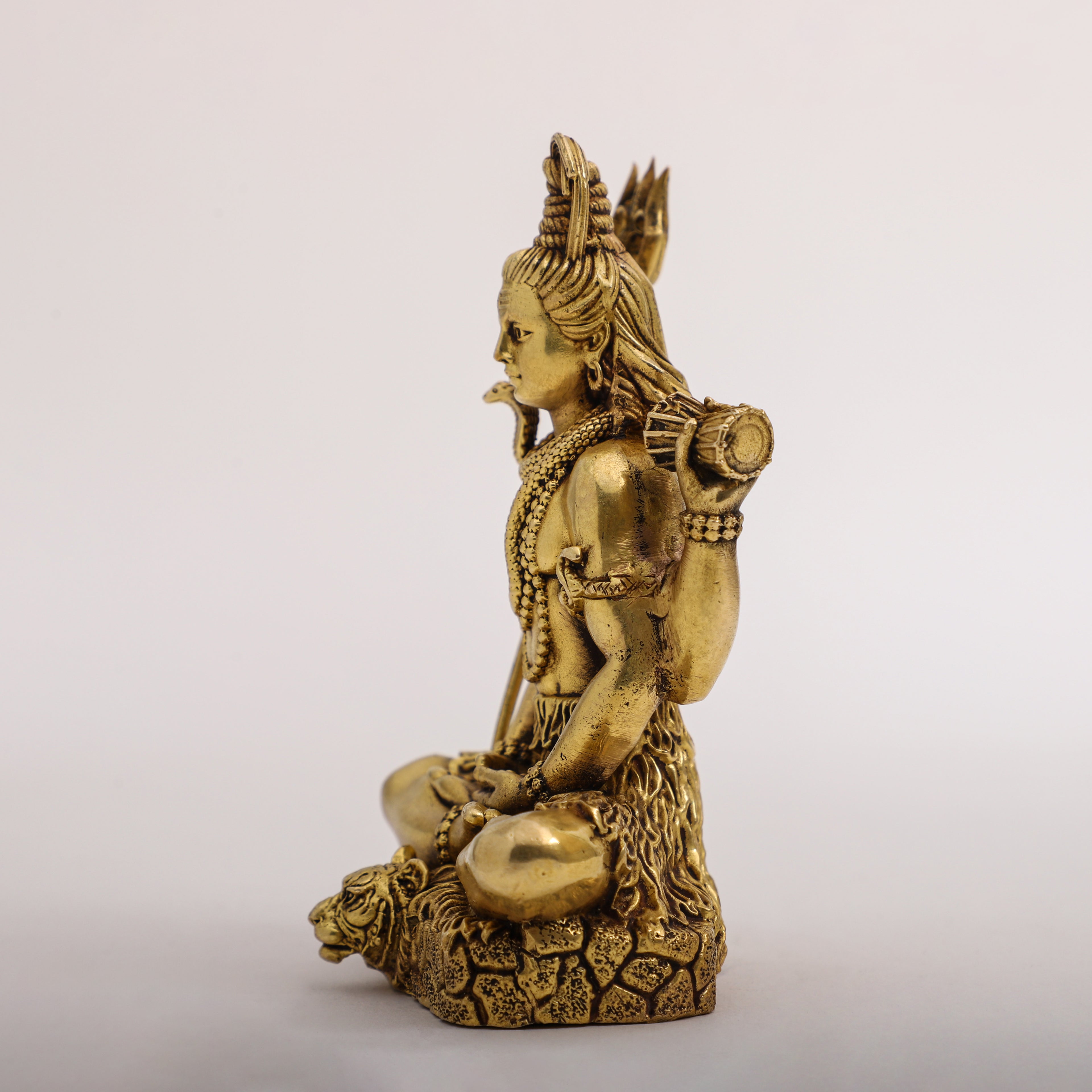 Brass Lord Shiva sitting on Tiger Headed Skin