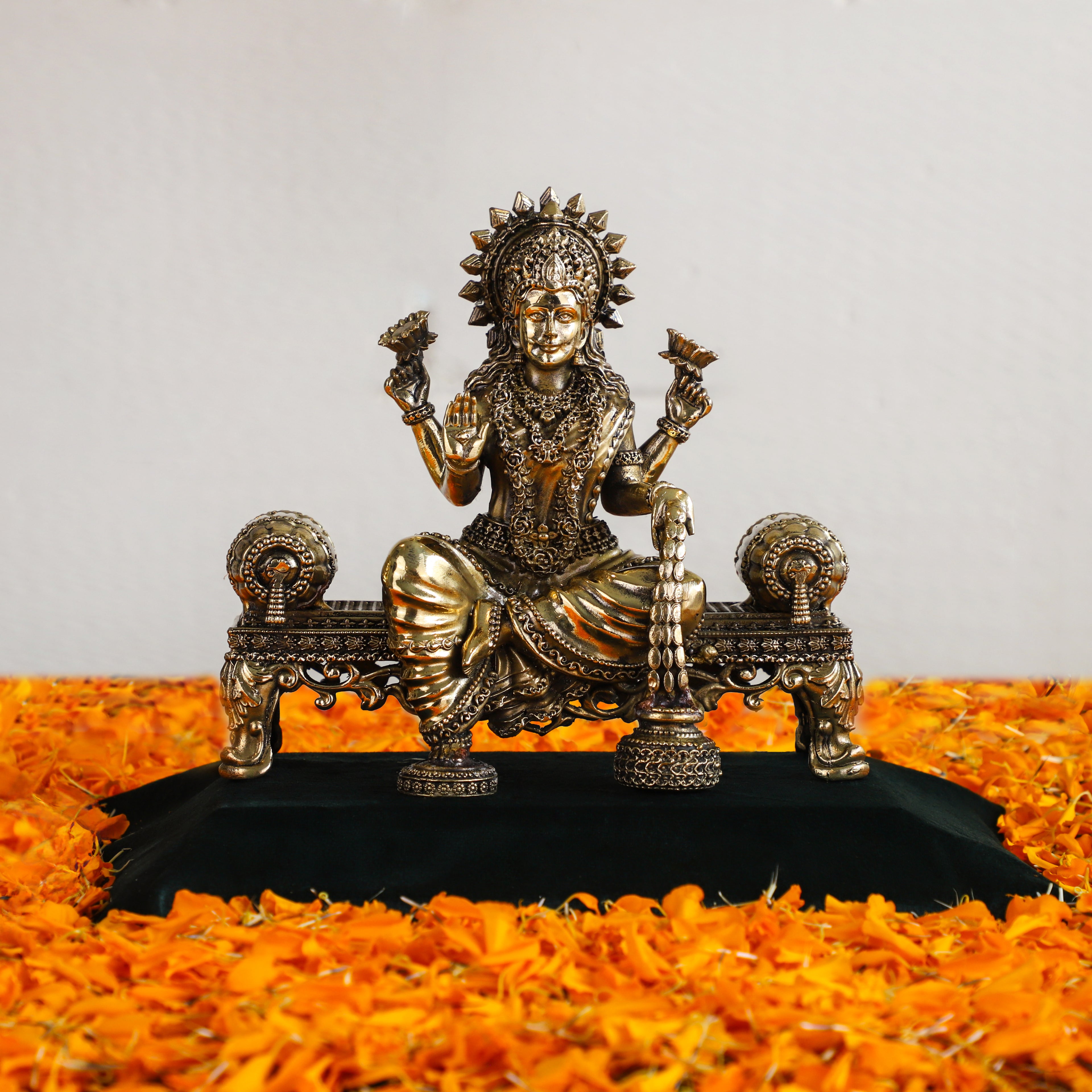 Brass Goddess Laxmi sitting Singhasaan